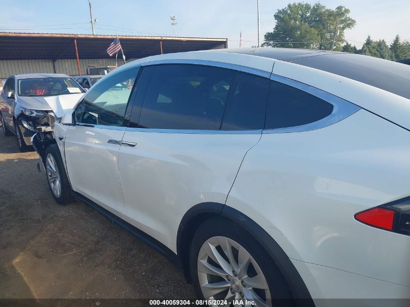 2020 Tesla Model X Long Range Dual Motor All-Wheel Drive/Long Range Plus Dual Motor All-Wheel Drive VIN: 5YJXCDE24LF242609 Lot: 40059304