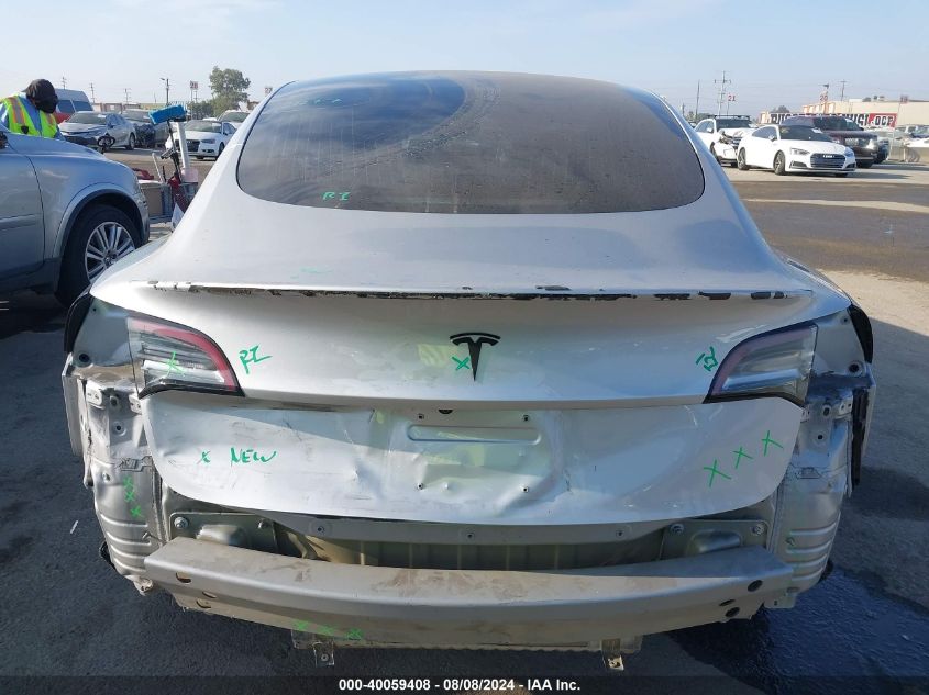 2018 Tesla Model 3 Long Range/Mid Range VIN: 5YJ3E1EA7JF077277 Lot: 40059408