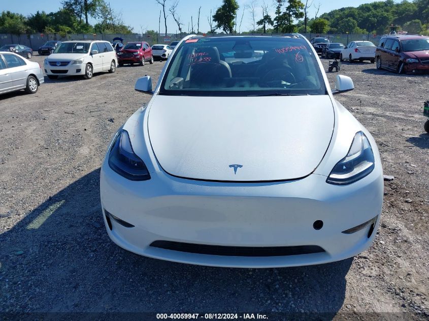 2023 Tesla Model Y Awd/Long Range Dual Motor All-Wheel Drive VIN: 7SAYGDEE2PF704533 Lot: 40059947