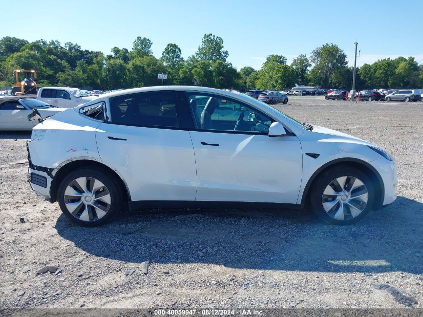 2023 Tesla Model Y Awd/Long Range Dual Motor All-Wheel Drive VIN: 7SAYGDEE2PF704533 Lot: 40059947