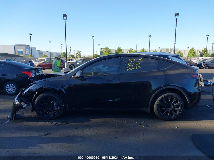 2023 Tesla Model Y Awd/Long Range Dual Motor All-Wheel Drive VIN: 7SAYGDEE3PA110496 Lot: 40060030