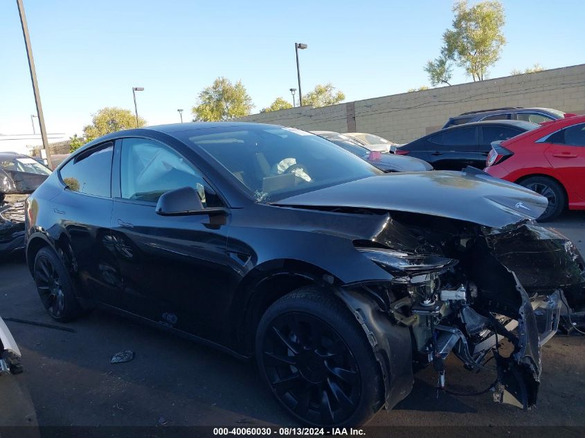 2023 Tesla Model Y Awd/Long Range Dual Motor All-Wheel Drive VIN: 7SAYGDEE3PA110496 Lot: 40060030