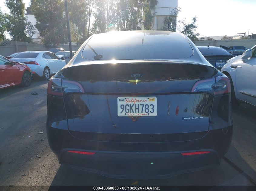 2023 Tesla Model Y Awd/Long Range Dual Motor All-Wheel Drive VIN: 7SAYGDEE3PA110496 Lot: 40060030