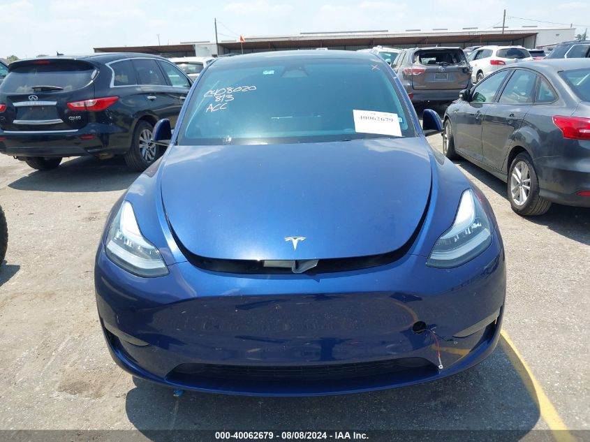 2023 Tesla Model Y VIN: 7SAYGDEE9PA041863 Lot: 40062679