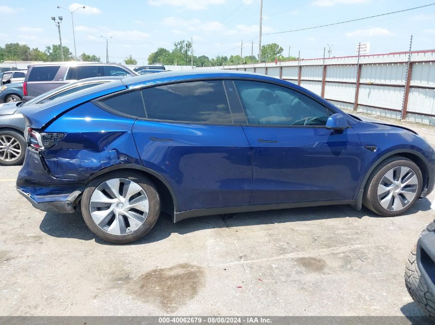 2023 Tesla Model Y VIN: 7SAYGDEE9PA041863 Lot: 40062679