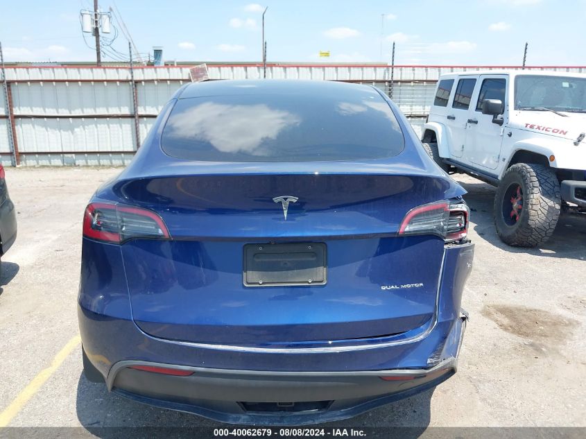 2023 Tesla Model Y VIN: 7SAYGDEE9PA041863 Lot: 40062679