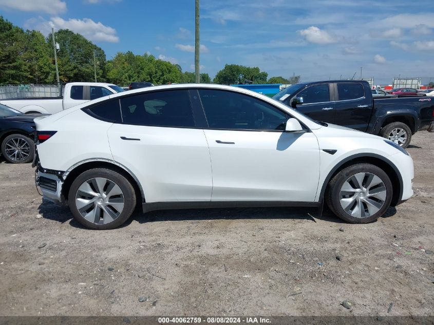 2023 Tesla Model Y Awd/Long Range Dual Motor All-Wheel Drive VIN: 7SAYGDEE0PF686632 Lot: 40062759