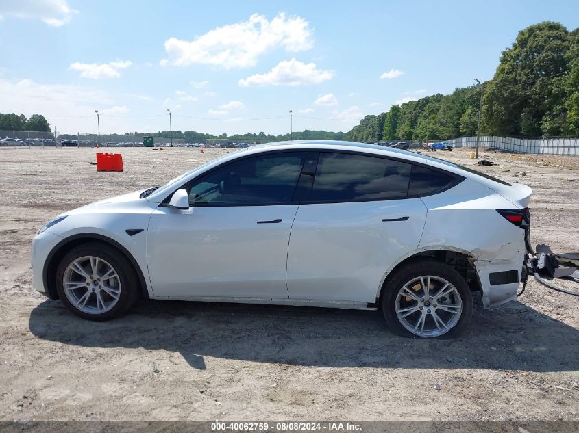 2023 Tesla Model Y Awd/Long Range Dual Motor All-Wheel Drive VIN: 7SAYGDEE0PF686632 Lot: 40062759