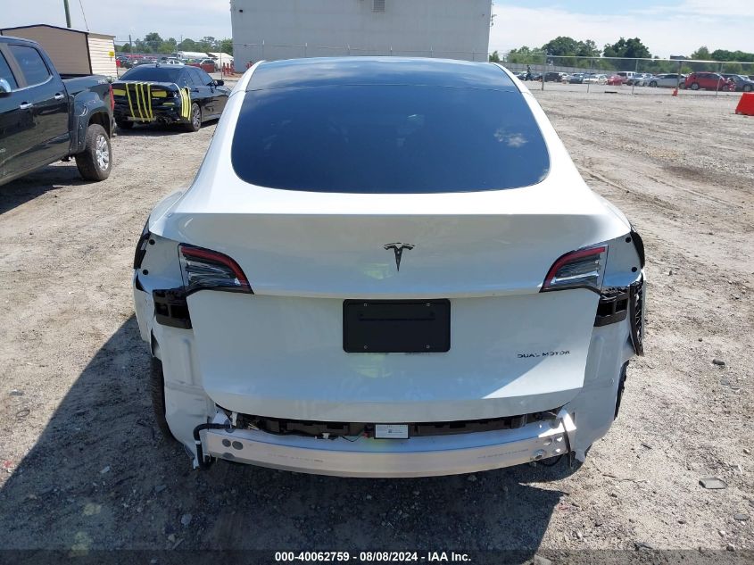 2023 Tesla Model Y Awd/Long Range Dual Motor All-Wheel Drive VIN: 7SAYGDEE0PF686632 Lot: 40062759