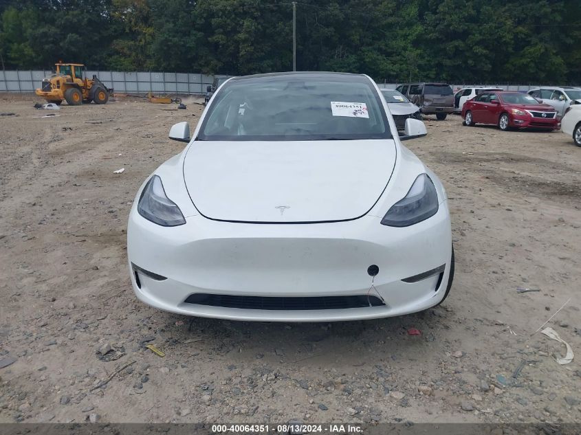 2023 Tesla Model Y Rwd VIN: 7SAYGDED6PF957135 Lot: 40064351