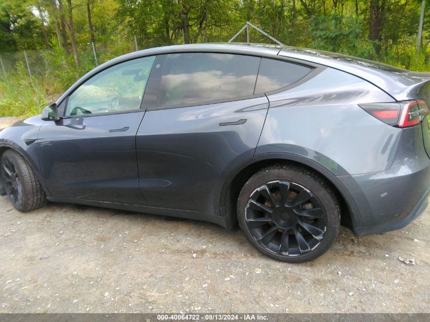 2023 Tesla Model Y Awd/Long Range Dual Motor All-Wheel Drive VIN: 7SAYGDEE5PF637572 Lot: 40064722