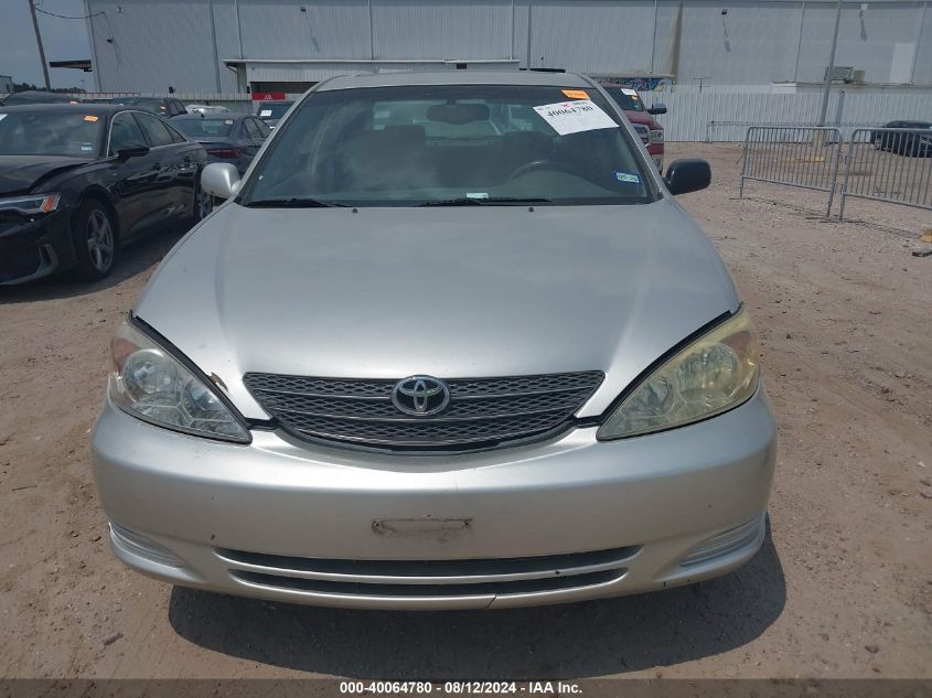 2002 Toyota Camry Xle VIN: JTDBE30K120100785 Lot: 40064780