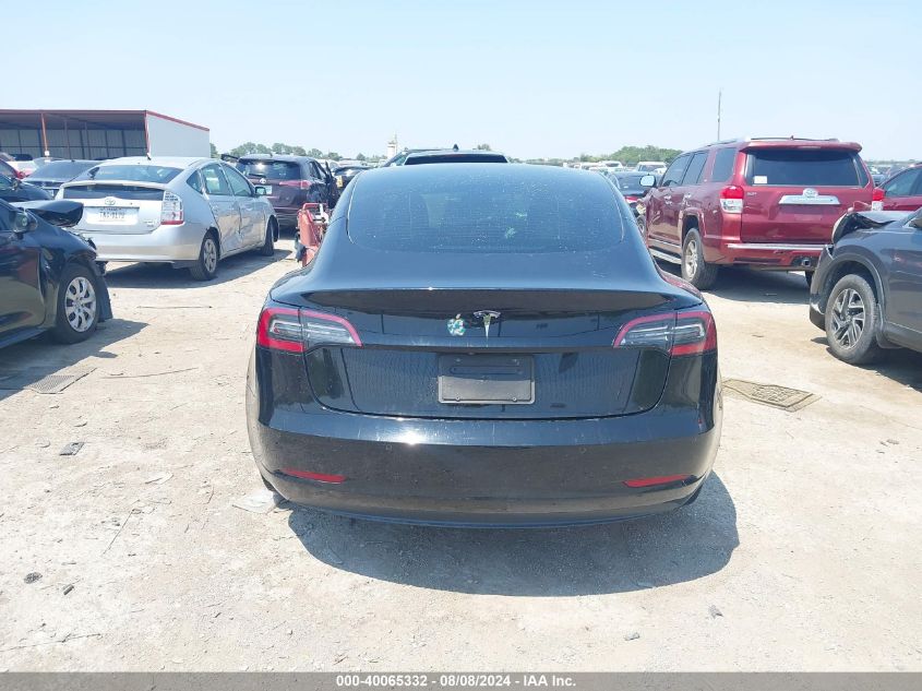 2021 Tesla Model 3 Standard Range Plus Rear-Wheel Drive VIN: 5YJ3E1EA3MF915695 Lot: 40065332