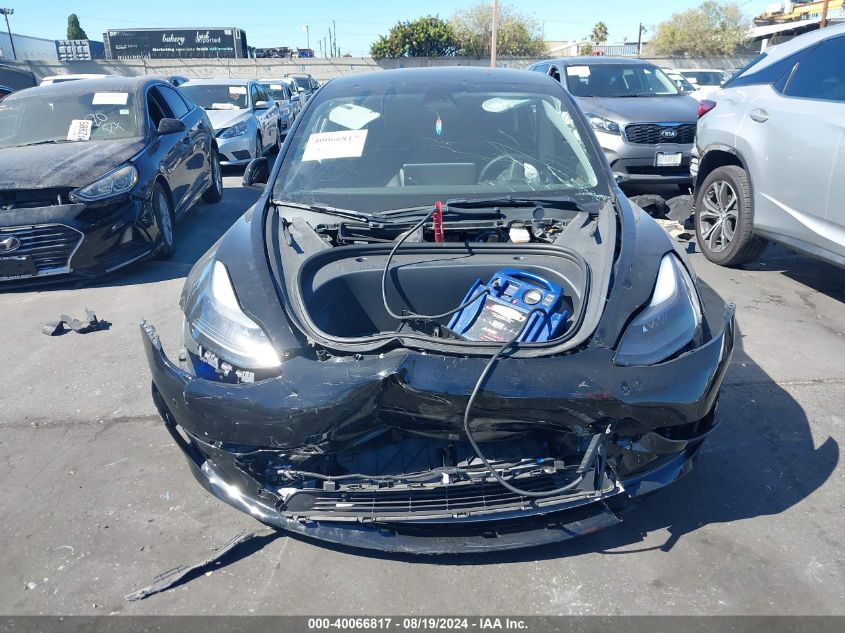 2023 Tesla Model 3 VIN: 5YJ3E1EC0PF412017 Lot: 40066817