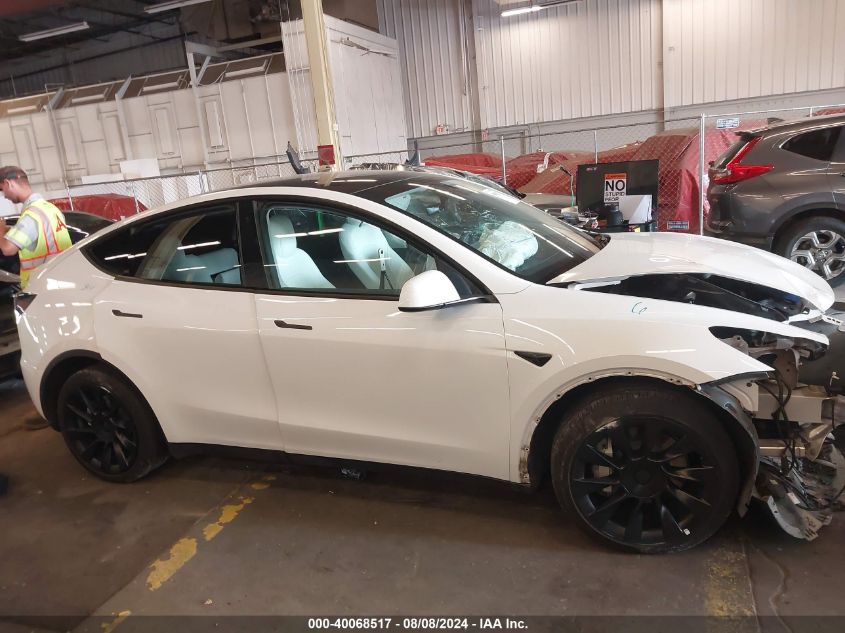 2023 Tesla Model Y Awd/Long Range Dual Motor All-Wheel Drive VIN: 7SAYGDEE9PF627465 Lot: 40068517