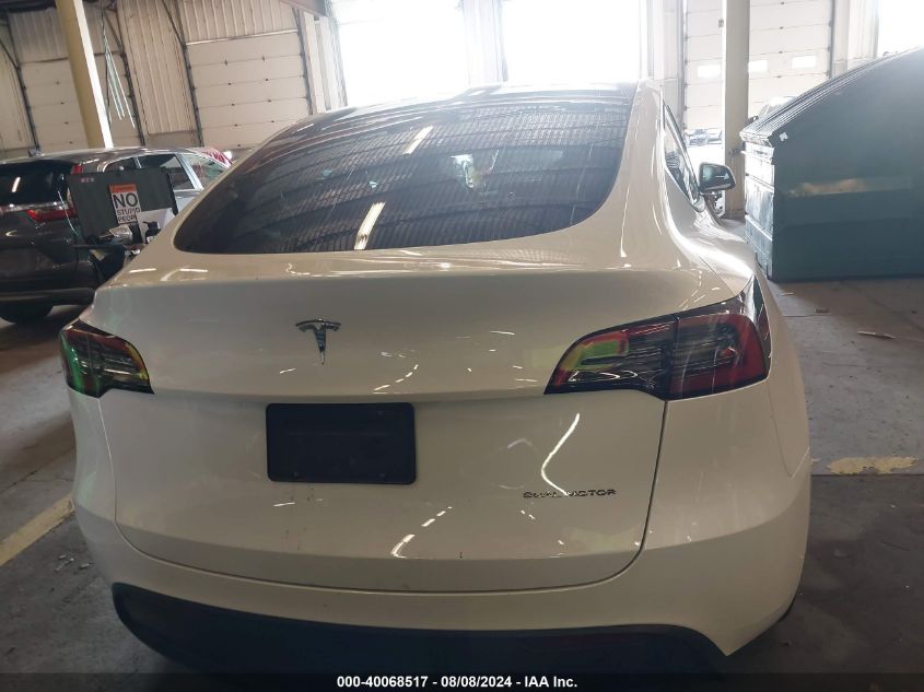 2023 Tesla Model Y Awd/Long Range Dual Motor All-Wheel Drive VIN: 7SAYGDEE9PF627465 Lot: 40068517