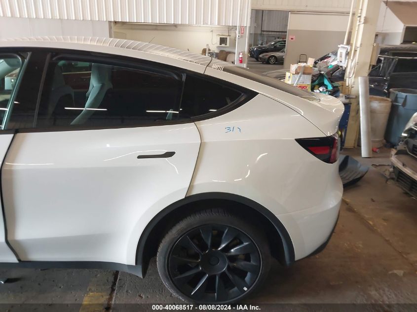 2023 Tesla Model Y Awd/Long Range Dual Motor All-Wheel Drive VIN: 7SAYGDEE9PF627465 Lot: 40068517