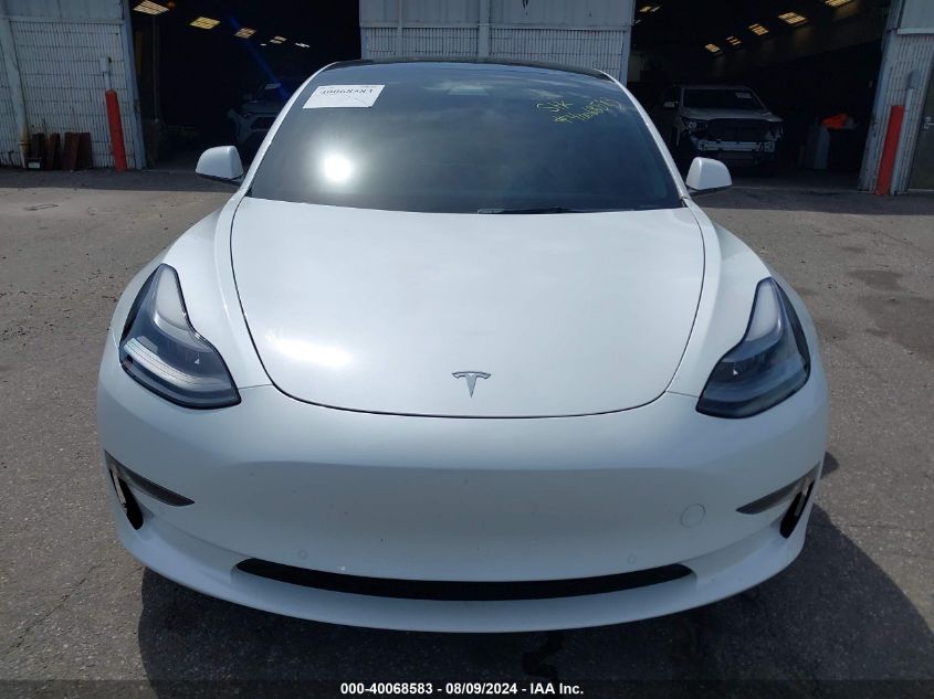 2022 Tesla Model 3 Long Range Dual Motor All-Wheel Drive VIN: 5YJ3E1EB7NF181573 Lot: 40068583