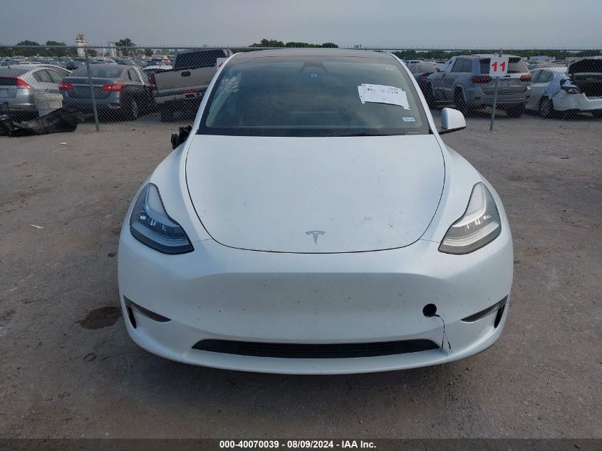 2023 Tesla Model Y Awd/Long Range Dual Motor All-Wheel Drive VIN: 7SAYGDEE0PA096072 Lot: 40070039