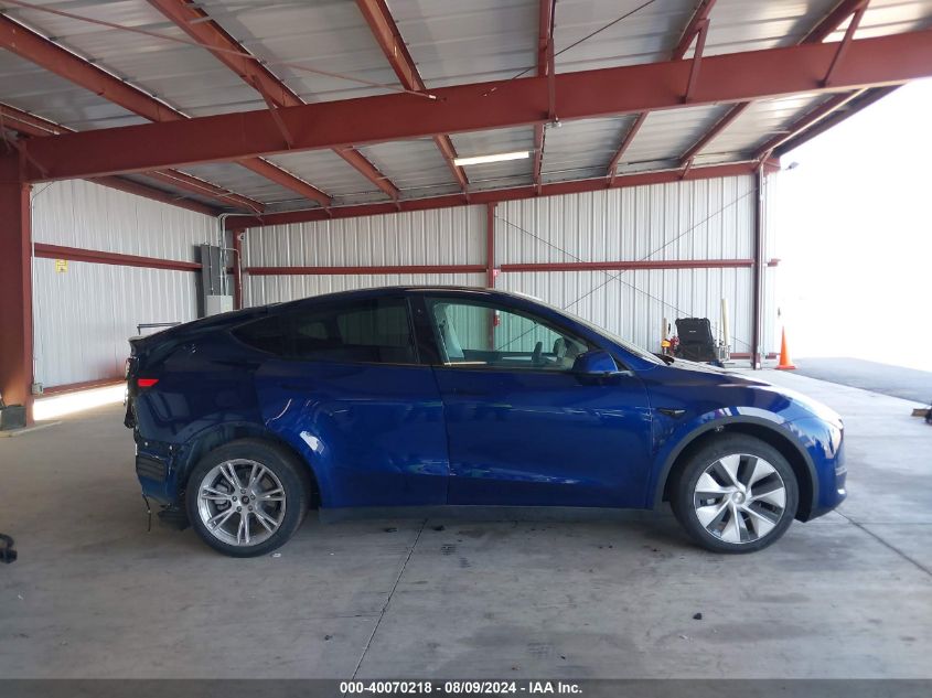 2023 Tesla Model Y Awd/Long Range Dual Motor All-Wheel Drive VIN: 7SAYGDEE5PF714585 Lot: 40070218