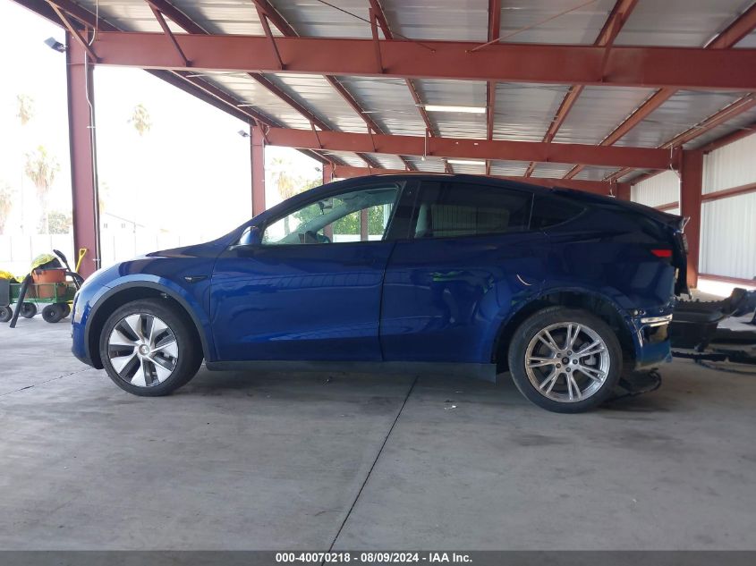 2023 Tesla Model Y Awd/Long Range Dual Motor All-Wheel Drive VIN: 7SAYGDEE5PF714585 Lot: 40070218