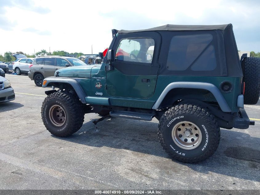 1999 Jeep Wrangler Sahara VIN: 1J4FY49S1XP418545 Lot: 40074910