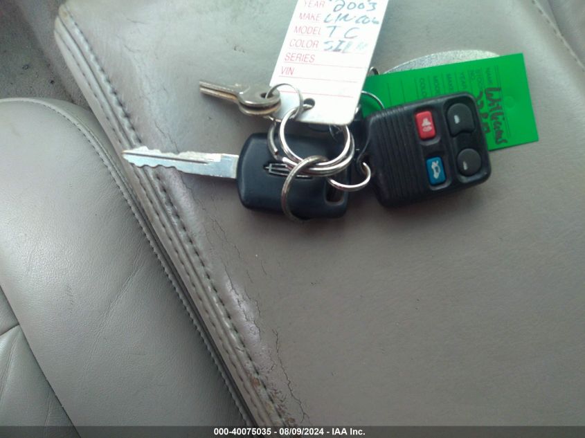 2003 Lincoln Town Car Signature VIN: 1LNHM82W83Y701104 Lot: 40075035