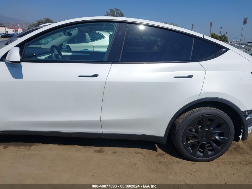 2023 Tesla Model Y Awd/Long Range Dual Motor All-Wheel Drive VIN: 7SAYGDEE0PF878276 Lot: 40077693