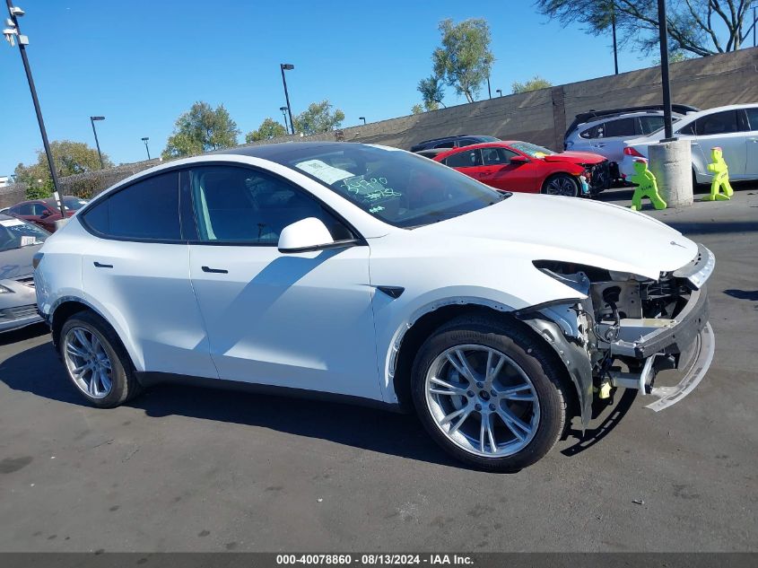 2023 Tesla Model Y Awd/Long Range Dual Motor All-Wheel Drive VIN: 7SAYGDEE5PF866382 Lot: 40078860