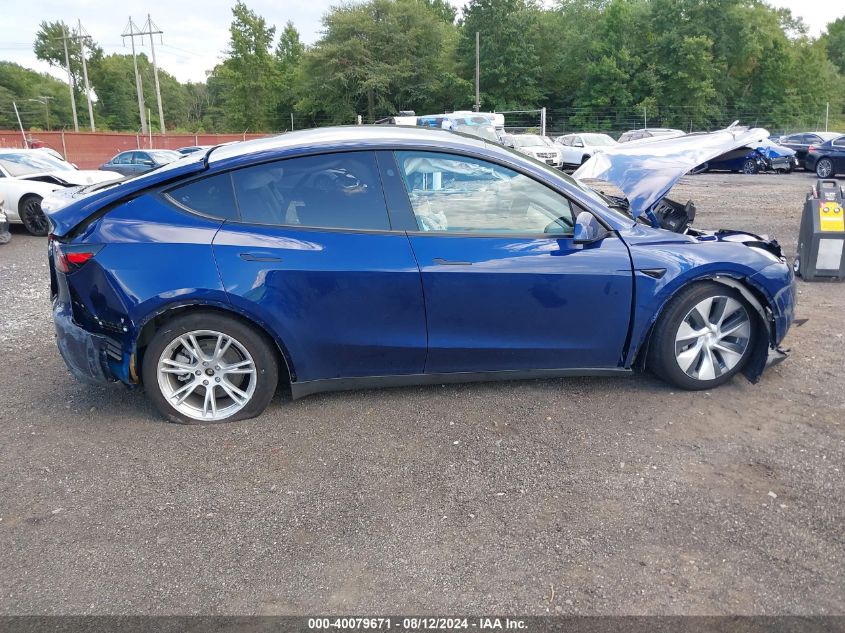 2023 Tesla Model Y Awd/Long Range Dual Motor All-Wheel Drive VIN: 7SAYGAEE1PF806470 Lot: 40079671