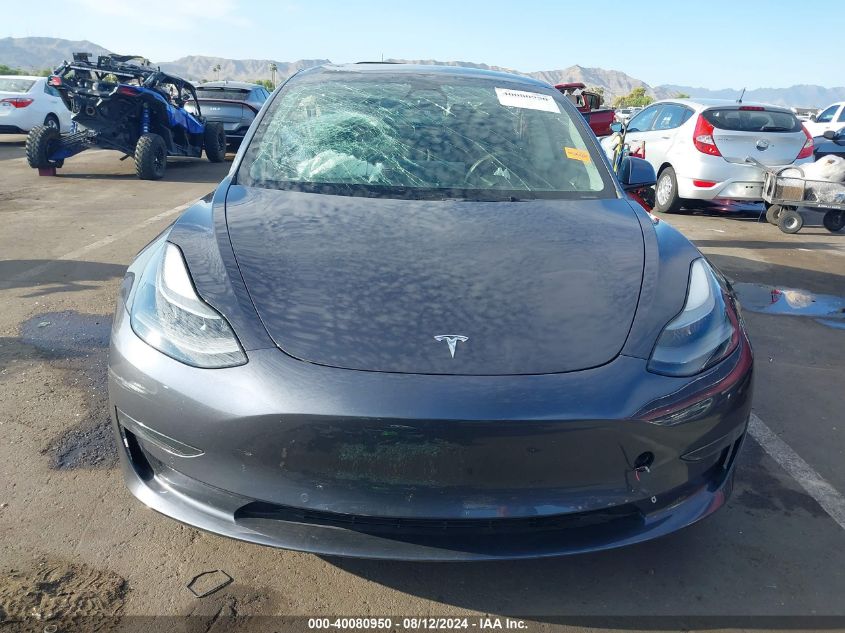 2021 Tesla Model 3 Standard Range Plus Rear-Wheel Drive VIN: 5YJ3E1EA9MF100496 Lot: 40080950