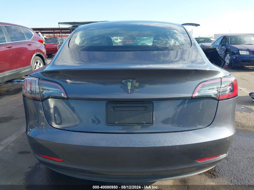 2021 Tesla Model 3 Standard Range Plus Rear-Wheel Drive VIN: 5YJ3E1EA9MF100496 Lot: 40080950