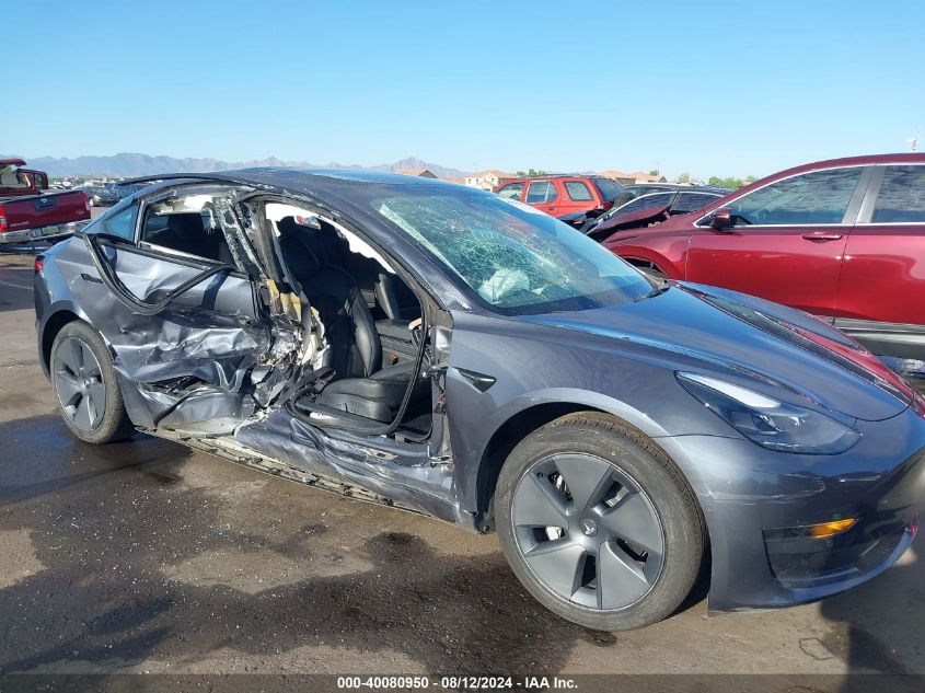 2021 Tesla Model 3 Standard Range Plus Rear-Wheel Drive VIN: 5YJ3E1EA9MF100496 Lot: 40080950