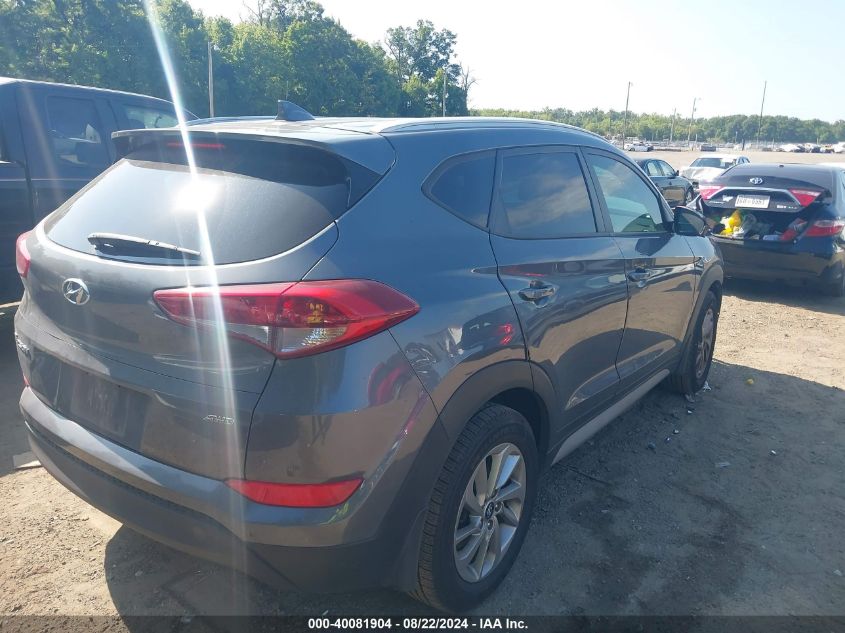 VIN JM1NDAM7XK0309873 2018 HYUNDAI TUCSON no.4