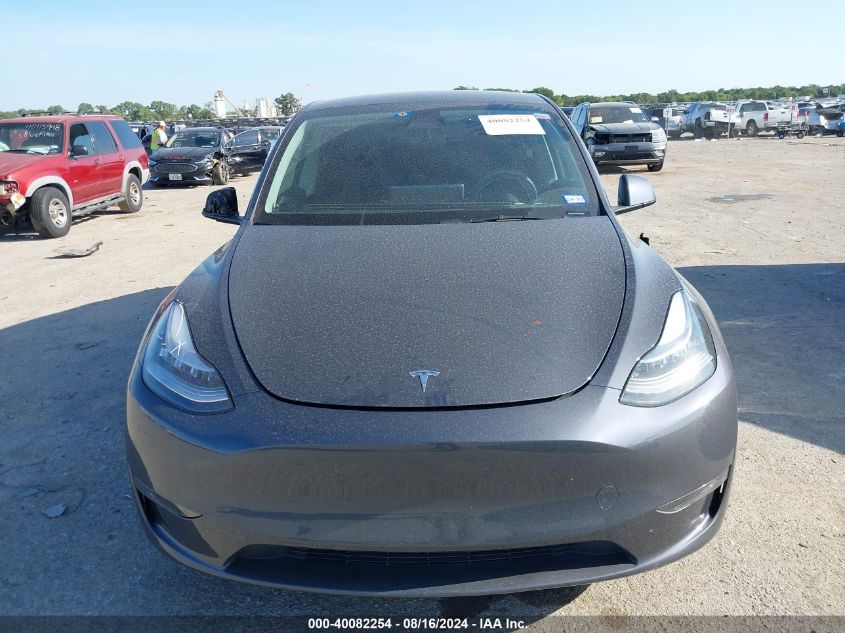 2023 Tesla Model Y Awd/Long Range Dual Motor All-Wheel Drive VIN: 7SAYGDEE0PA114053 Lot: 40082254