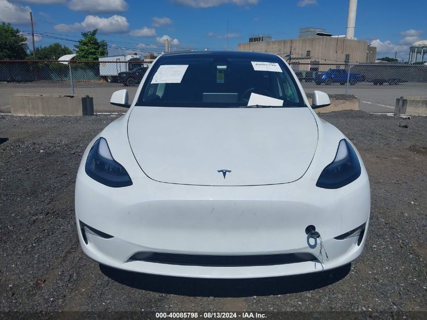 2023 Tesla Model Y VIN: 7SAYGDEE9PA180732 Lot: 40085798