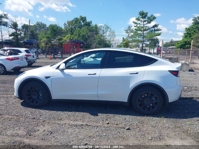 2023 Tesla Model Y VIN: 7SAYGDEE9PA180732 Lot: 40085798