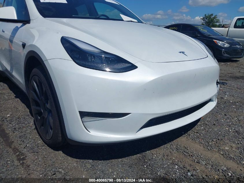 2023 Tesla Model Y VIN: 7SAYGDEE9PA180732 Lot: 40085798