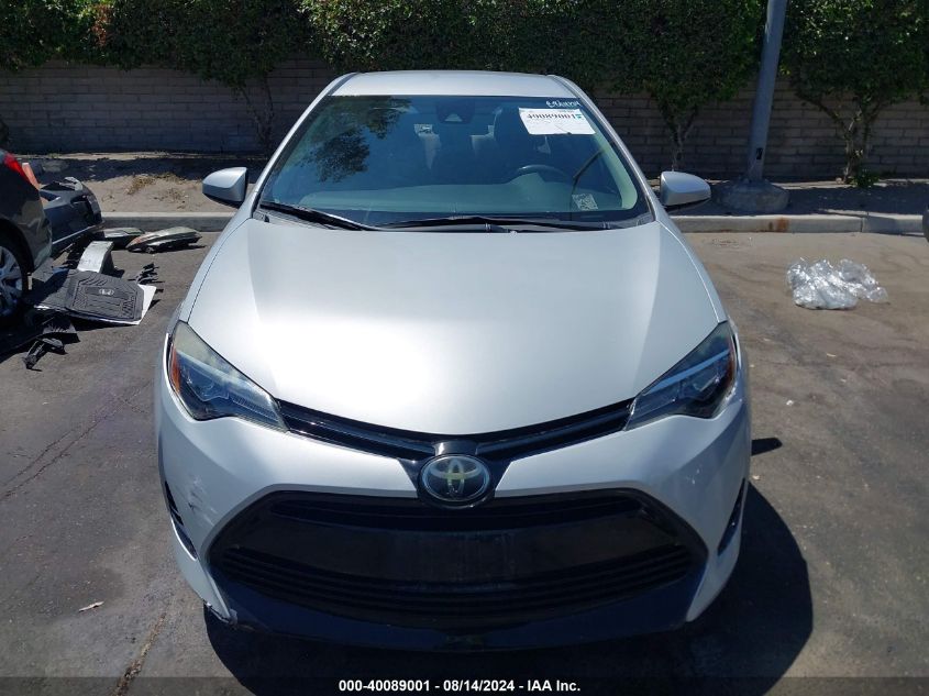 2018 Toyota Corolla Le VIN: 5YFBURHE8JP772027 Lot: 40089001