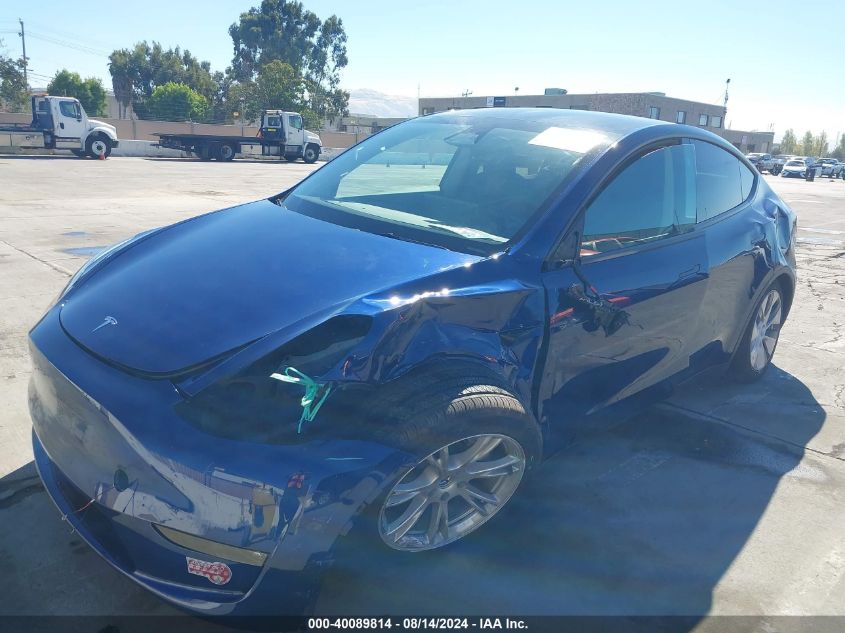 2023 Tesla Model Y Awd/Long Range Dual Motor All-Wheel Drive VIN: 7SAYGAEE2PF859887 Lot: 40089814