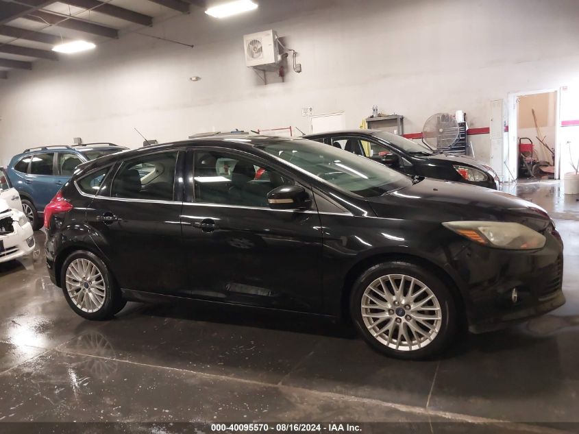 2014 Ford Focus Titanium VIN: 1FADP3N23EL130777 Lot: 40095570