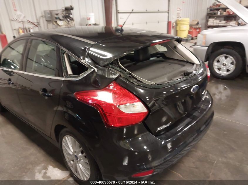 2014 Ford Focus Titanium VIN: 1FADP3N23EL130777 Lot: 40095570