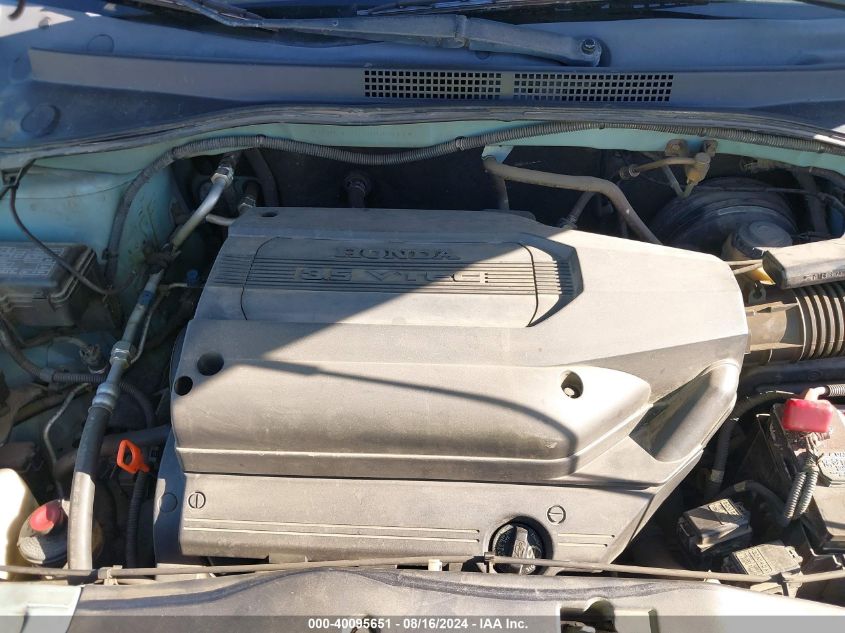 2002 Honda Odyssey Exl VIN: 2HKRL18982H588114 Lot: 40095651