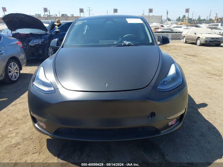 2023 Tesla Model Y Awd/Long Range Dual Motor All-Wheel Drive VIN: 7SAYGDEE3PF885349 Lot: 40099429