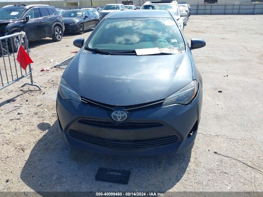 2017 Toyota Corolla Le VIN: 5YFBURHE8HP691765 Lot: 40099460