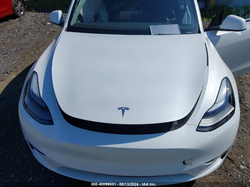 2024 Tesla Model Y Long Range Dual Motor All-Wheel Drive VIN: 7SAYGDEE6RA284906 Lot: 40099531