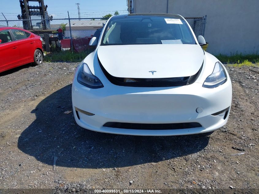 2024 Tesla Model Y Long Range Dual Motor All-Wheel Drive VIN: 7SAYGDEE6RA284906 Lot: 40099531