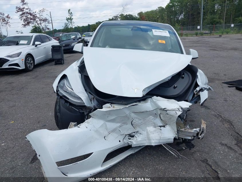 2022 Tesla Model Y Long Range Dual Motor All-Wheel Drive VIN: 7SAYGDEE3NF311010 Lot: 40100438