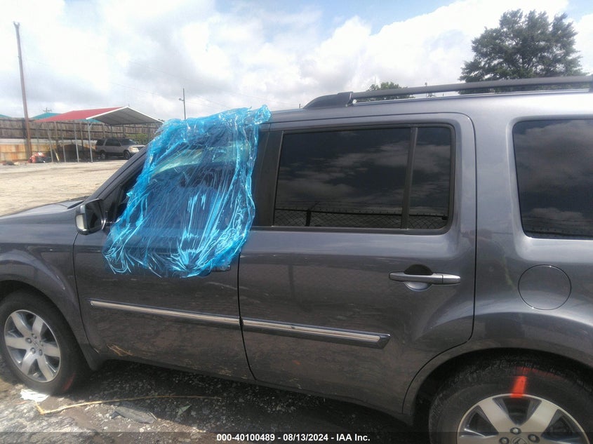 2014 HONDA PILOT TOURING - 5FNYF3H99EB009357