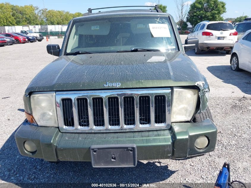 2007 Jeep Commander Sport VIN: 1J8HG48K77C597841 Lot: 40102536